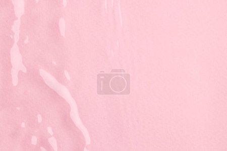 Photo for Close up of water ripples and waves with copy space on pink background. Water, liquid and colour concept. - Royalty Free Image