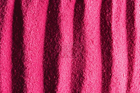 Foto de Primer plano del patrón de arena rosa y copia el fondo del espacio. Arena, textura, movimiento, forma y concepto de color. - Imagen libre de derechos