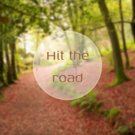 Photo for Composite of hit the road text over path and forest landscape. Road, travel, vacation and journey concept digitally generated image. - Royalty Free Image