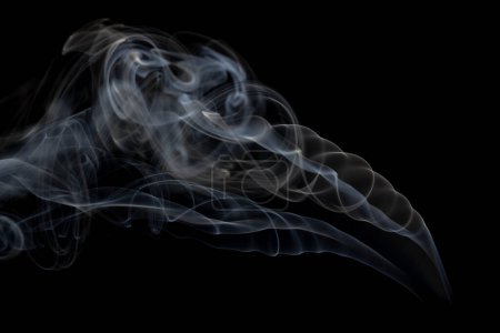 Photo for White clouds of smoke with copy space on black background. Halloween, colour, movement and smoke concept. - Royalty Free Image