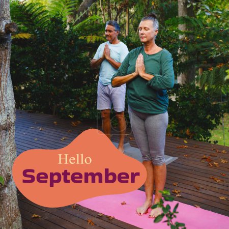 Photo for Composite of hello september text over caucasian couple practicing yoga in garden. Hello september, fall, autumn and nature concept digitally generated image. - Royalty Free Image