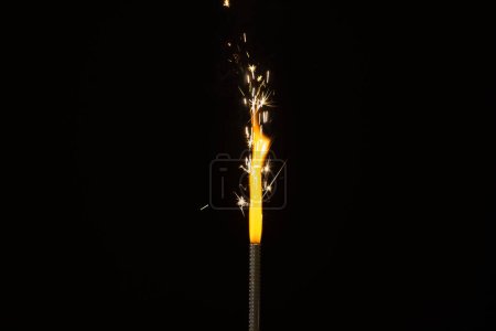 Photo for Close up of gas lighter with flames and copy space on black background. Fire, flames, heat and light concept. - Royalty Free Image