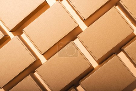 Photo for Rows of boxes and copy space over cream background. Cyber monday, black friday, online shopping, shipping and global connections concept. - Royalty Free Image