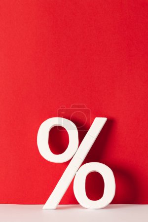Photo for White percent sign with copy space against red background. Black friday, cyber monday, shopping, cyber shopping, sales, retail and shipping concept. - Royalty Free Image