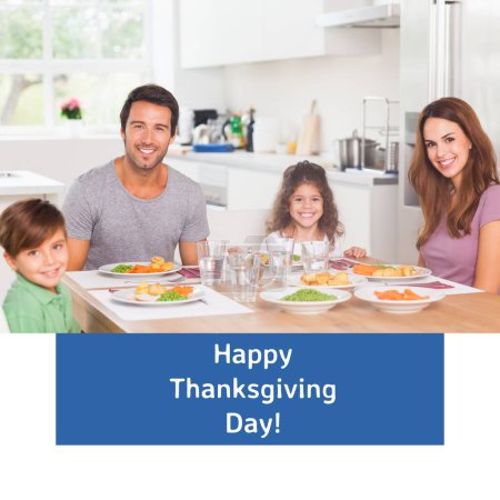 Photo for Happy thanksgiving day text on blue with smiling caucasian family at dinner table. Thanksgiving, harvest festival, american tradition, family and autumn celebration digitally generated image. - Royalty Free Image