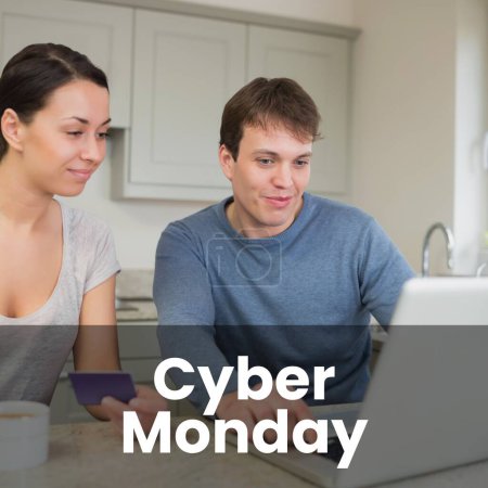 Photo for Cyber monday text over happy caucasian couple in kitchen using laptop and credit card online. Cyber monday, online shopping and sale promotion concept digitally generated image. - Royalty Free Image