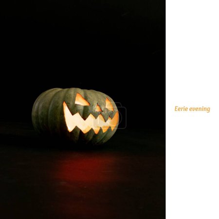 Photo for Eerie evening text on white and carved jack o lantern halloween pumpkin on black background. Halloween, october 31st, all hallows' eve, tradition and celebration, digitally generated image. - Royalty Free Image