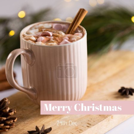 Photo for Composite of merry christmas and 24th dec text over hot chocolate mug with marshmallows and cinnamon. Greeting, drink, sweet, christmas festivity, winter holiday and celebration concept. - Royalty Free Image