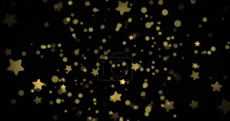 Foto de Composición de estrellas doradas y manchas sobre fondo negro. Tradición navideña y concepto de celebración imagen generada digitalmente. - Imagen libre de derechos