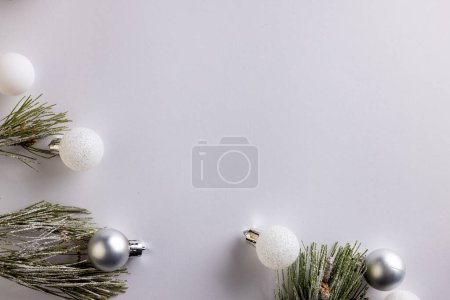 Photo for Christmas baubles decorations with copy space on white background. Christmas, decorations, tradition and celebration concept. - Royalty Free Image