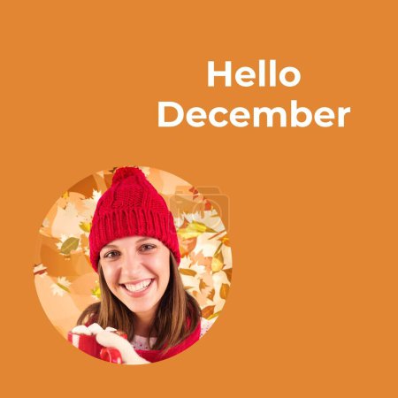 Téléchargez les photos : Bonjour décembre texte sur orange et heureuse femme caucasienne en vêtements chauds avec chocolat chaud de Noël. Célébration de l'hiver, salutation saisonnière et traditions de Noël, image générée numériquement. - en image libre de droit