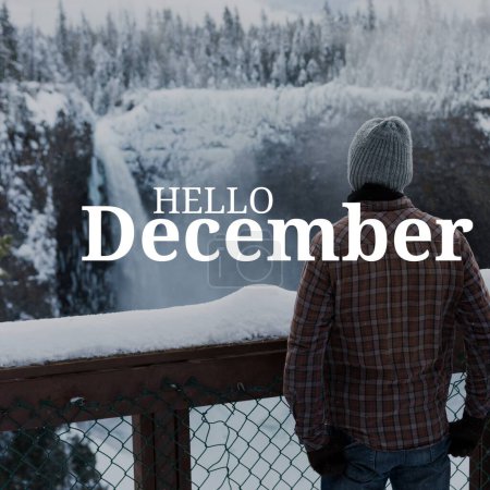 Photo for Composite of hello december text over caucasian woman in winter scenery. December, christmas, tradition, celebration and winter concept digitally generated image. - Royalty Free Image