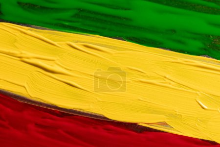 Photo for Green, yellow and red paints with copy space background. Black history month, africa, black culture and history concept. - Royalty Free Image