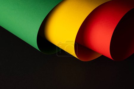 Photo for Green, yellow and red papers with copy space on black background. Black history month, africa, black culture and history concept. - Royalty Free Image