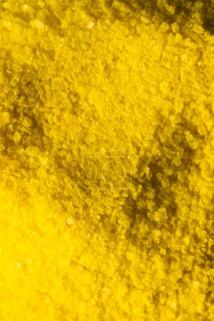 Photo for Vertical image of close up of yellow powder with copy space background. Black history month, africa, black culture and history concept. - Royalty Free Image