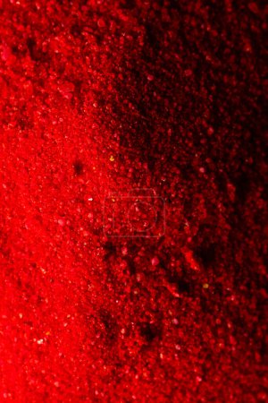 Photo for Vertical image of close up of red powder with copy space background. Black history month, africa, black culture and history concept. - Royalty Free Image