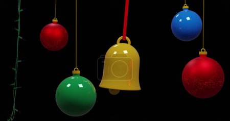 Photo for Coloured christmas string lights flashing and colourful baubles swinging on black background. Christmas, decorations, tradition and celebration digitally generated image. - Royalty Free Image