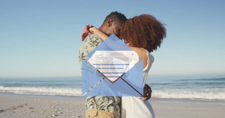 Photo for Image of email envelope digital icon over couple in love hugging on beach. digital interface, social media and global technology concept digitally generated image. - Royalty Free Image