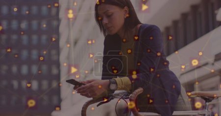 Photo for Image of network of connections with digital icons over woman using smartphone. global social media, connection and communication concept digitally generated image. - Royalty Free Image