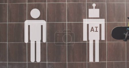 Téléchargez les photos : Des panneaux de toilettes représentent un humain et une figure d'IA sur un mur carrelé. Les symboles représentent l'intégration de la technologie dans les espaces quotidiens. - en image libre de droit