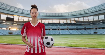Photo for Image of biracial female soccer player over stadium. Global sport, patriotism and digital interface concept digitally generated image. - Royalty Free Image