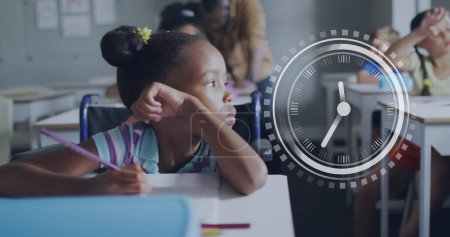 Photo for Image of clock over bored african american schoolgirl at desk in class. School, education, childhood and learning, digitally generated image. - Royalty Free Image