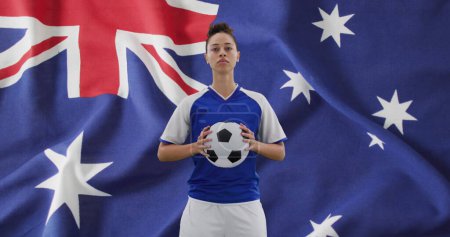 Photo for Image of biracial female soccer player over flag of australia. Global sport, patriotism and digital interface concept digitally generated image. - Royalty Free Image