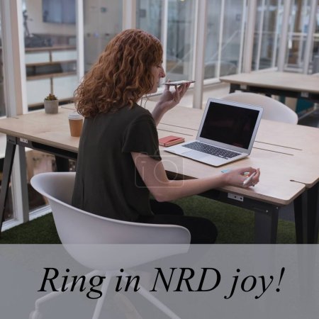 Photo for Composition of ring in nrd joy text over caucasian woman using smartphone and laptop. Receptionist day, professional and office work concept digitally generated image. - Royalty Free Image