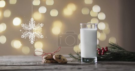 Foto de Imagen de decoraciones navideñas de copo de nieve, galletas y vaso de leche sobre fondo gris. Navidad, tradición y concepto de celebración imagen generada digitalmente. - Imagen libre de derechos