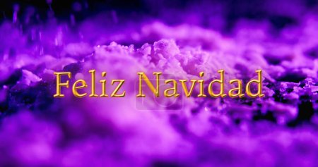 Photo for Image of feliz navidad text over purple particles falling in background. Christmas, tradition and celebration concept digitally generated image. - Royalty Free Image
