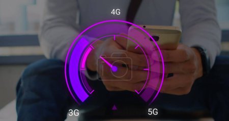 Photo for Image of purple speedometer over hands of businessman using smartphone. Internet speed, transfer, communication and technology concept digitally generated image. - Royalty Free Image
