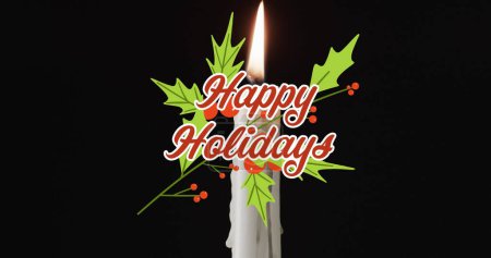 Photo for Image of happy holidays text over lit candle on black background. Christmas, tradition and celebration concept digitally generated image. - Royalty Free Image