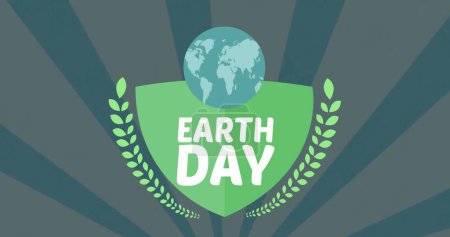 Image of shield with globe and earth day on green background. environment, sustainability, ecology, renewable energy, global warming and climate change awareness. puzzle 701135192