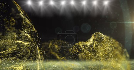 Image of golden particles moving over floodlit room. sport, competition, communication and technology concept, digitally generated image.