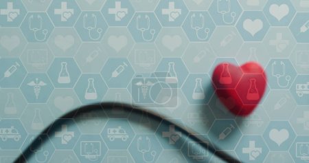 Bild medizinischer Ikonen über Stethoskop mit Herz. Globale Medizin und digitales Schnittstellenkonzept digital generiertes Bild.