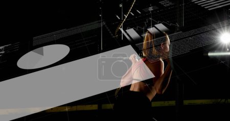 Photo for Image of digital interface with scopes scanning and data processing over woman exercising, lifting weights. Global computer network technology concept digitally generated image. - Royalty Free Image