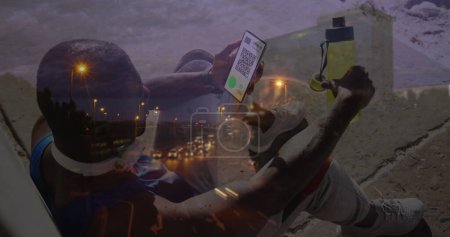 Photo for Image of man holding smartphone with covid 19 vaccination passport over cityscape. global covid 19 pandemic and vaccination concept digitally generated image. - Royalty Free Image