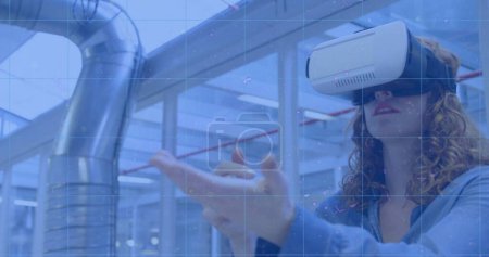 Image of scope scanning over woman wearing vr headset and moving her hands. global technology, connections and digital interface concept digitally generated image.