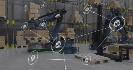 Image of network of conncetions with icons over robotic arms and boxes in warehouse. Global conncetions, innovation, delivery and shipping concept digitally generated image.