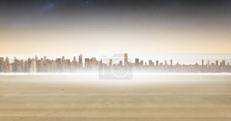 A city skyline emerges above a misty horizon at dawn. 