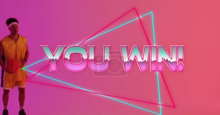 Image of you win text over neon pattern and biracial basketball player. Sports, competition, image game and communication concept digitally generated image.
