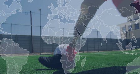 Photo for Image of world map over disabled african american man with artificial leg playing football. International day of persons with disabilities concept digitally generated image. - Royalty Free Image