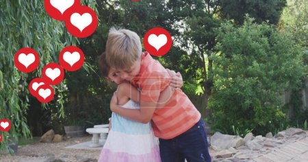 Image of heart icons over caucasian sibling hugging in garden. family life, childhood, love and care concept digitally generated image.
