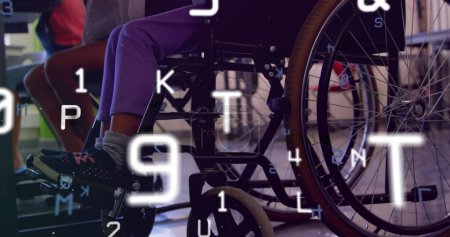 Image of data processing over disabled african american schoolgirl sitting in wheelchair. International day of persons with disabilities concept digitally generated image.
