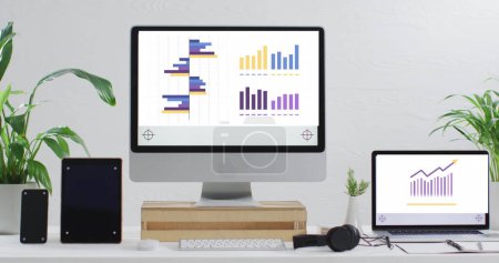 Image of financial data processing on computer screens. Global business, finances, computing and data processing concept digitally generated image.