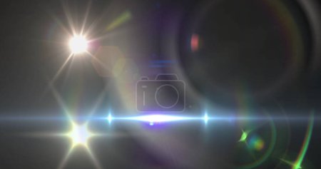 Photo for Image of spotlight with lens flare and light beam moving over dark background. movement, energy and light, abstract interface background concept digitally generated image. - Royalty Free Image