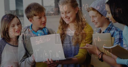 Photo for Image of mathematical equations over school children using laptop in classroom. education, learning and technology concept digitally generated image. - Royalty Free Image