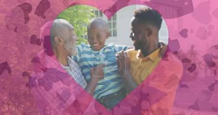 Bild der Herzen über der glücklichen afrikanisch-amerikanischen Männerfamilie der dritten Generation im Garten. Familie, häusliches Leben, Liebe und Pflegekonzept digital generiertes Image.
