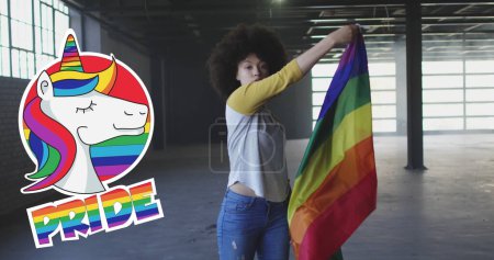 Photo for Image of rainbow pride and unicorn over african american woman with rainbow flag. lgbt rights and equality concept digitally generated image. - Royalty Free Image