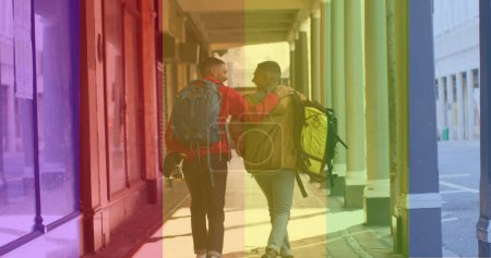 Téléchargez les photos : Image de la vue arrière du couple gay marchant dans la rue. lgbt droits et égalité concept image générée numériquement. - en image libre de droit